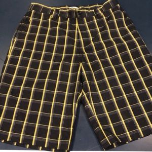 Men’s adidas black and yellow golf shorts